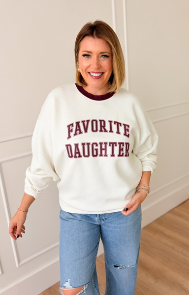 Women's collegiate-style sweatshirt at EVER Boutique